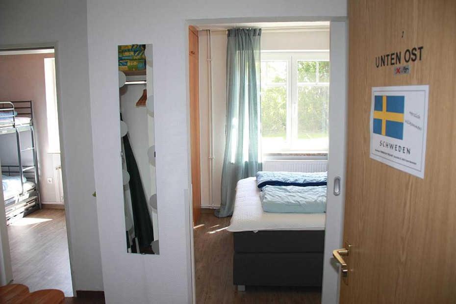 Postel nebo postele na pokoji v ubytování Haus Nordische Träume