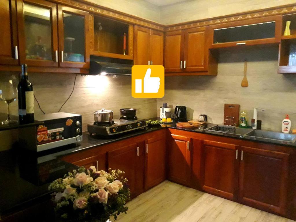 Kuchyň nebo kuchyňský kout v ubytování Adora Central Park Hostel