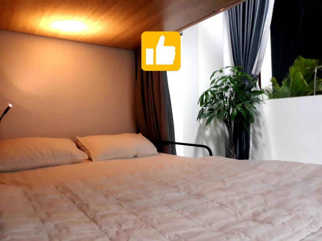 Postel nebo postele na pokoji v ubytování Adora Central Park Hostel