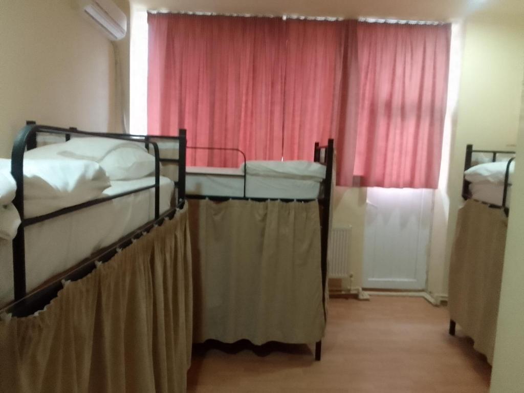 Postel nebo postele na pokoji v ubytování Wine Hostel