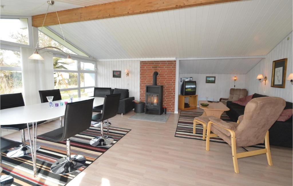 Posezení v ubytování Holiday Home Soltoften Løkken Xi