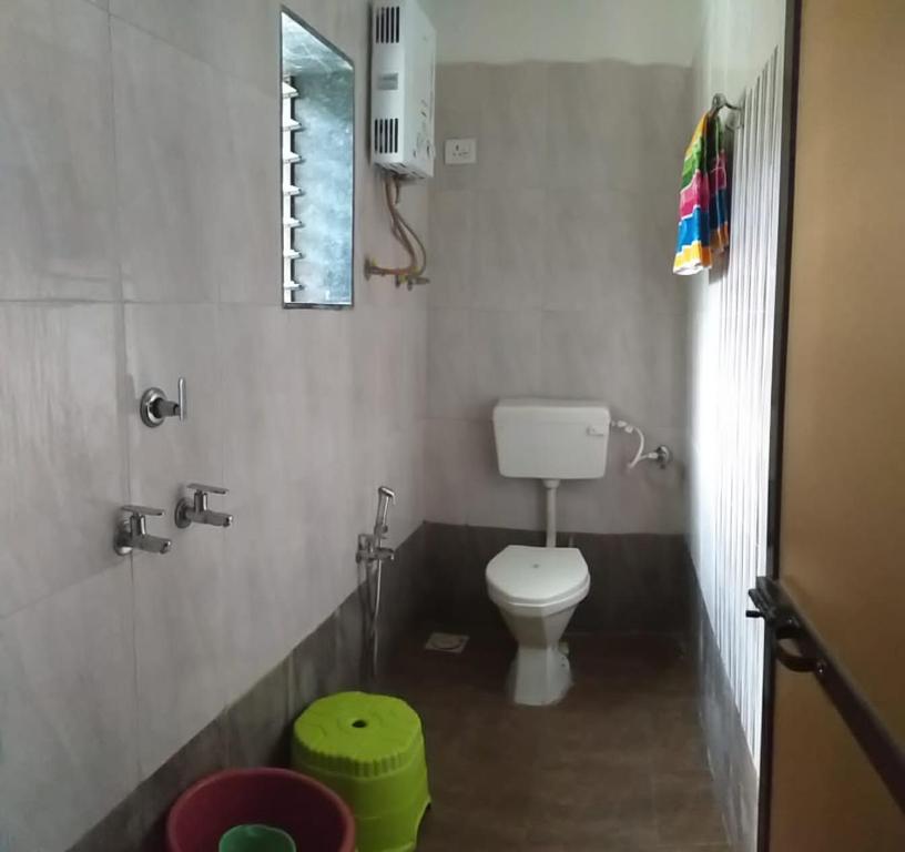 Koupelna v ubytování Kshanbhar Vishranti Home Stay