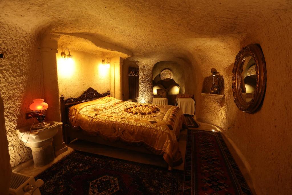 Postel nebo postele na pokoji v ubytování Sofa Hotel