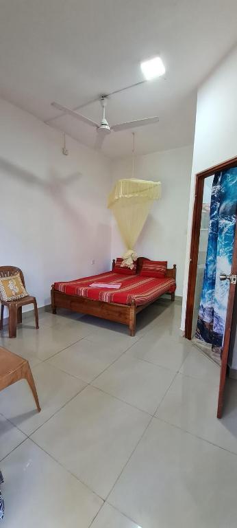 Postel nebo postele na pokoji v ubytování Wimala B&B