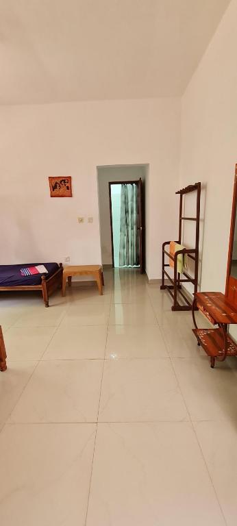 Postel nebo postele na pokoji v ubytování Wimala B&B