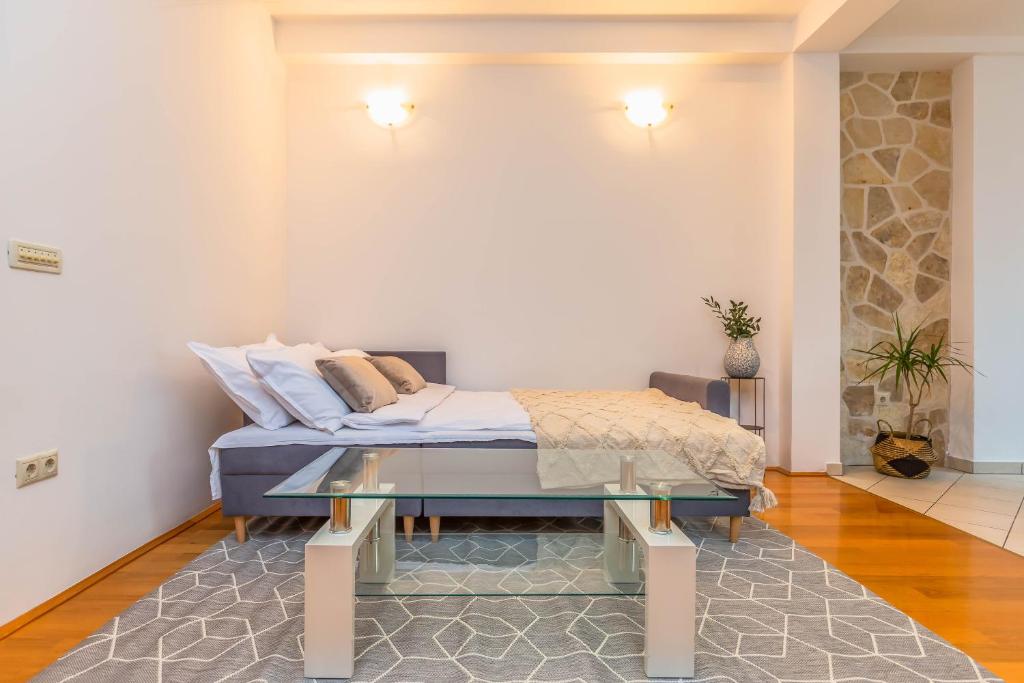 Postel nebo postele na pokoji v ubytování Beachfront apartment