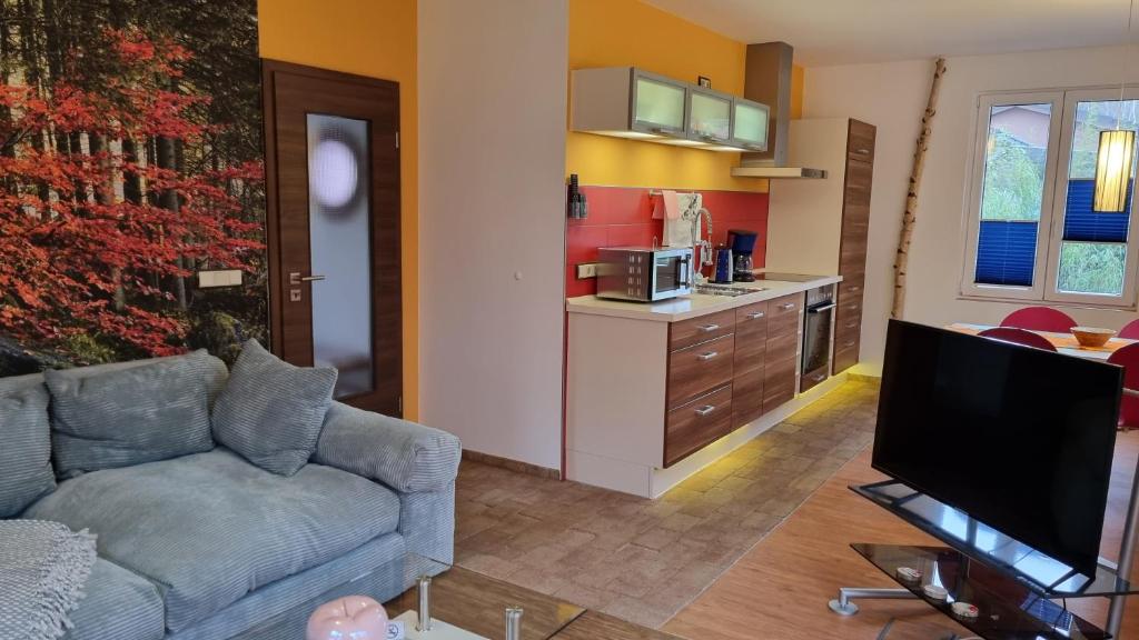 Kuchyň nebo kuchyňský kout v ubytování Ferienhaus Rehblick - direkt in der Natur, mit Lesezimmer und zwei Terrassen