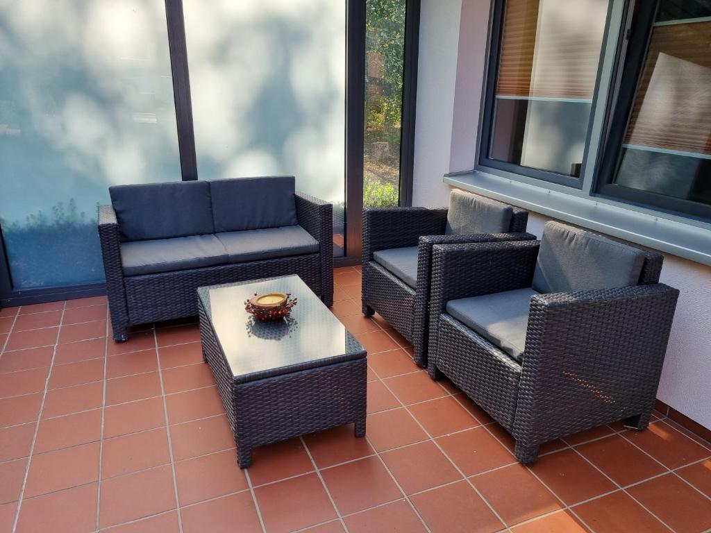 Posezení v ubytování Ferienhaus Rehblick - direkt in der Natur, mit Lesezimmer und zwei Terrassen