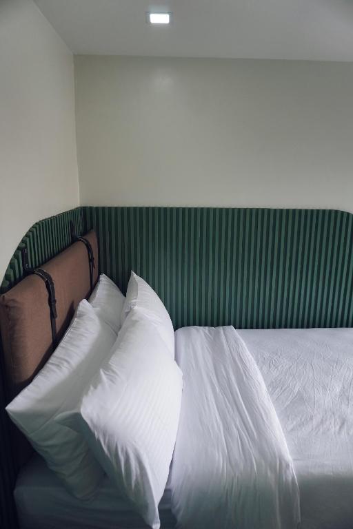 Postel nebo postele na pokoji v ubytování Cebu Backpackers Hostel