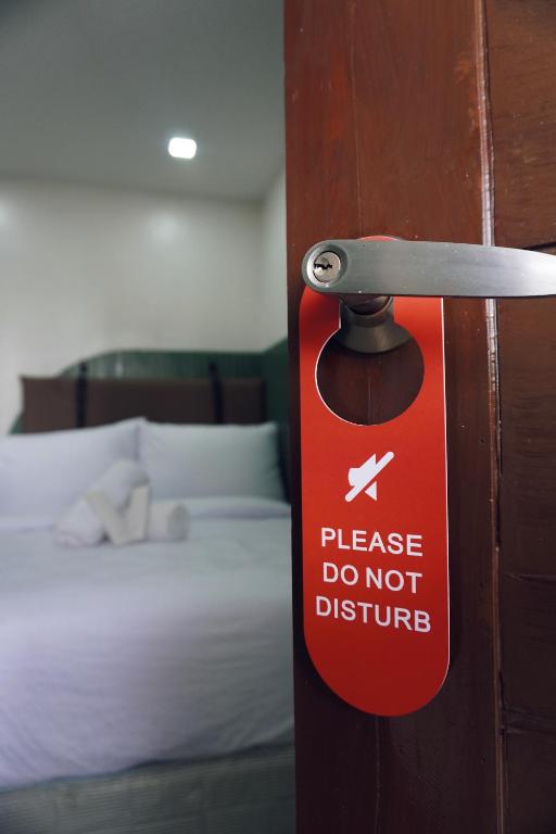 Postel nebo postele na pokoji v ubytování Cebu Backpackers Hostel