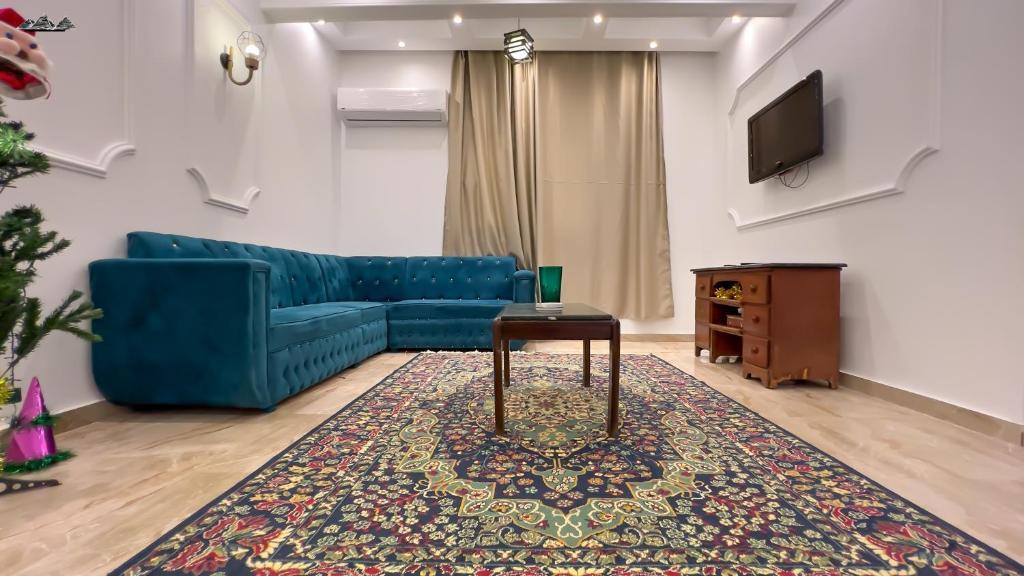 TV a/nebo společenská místnost v ubytování Sesa pyramids view