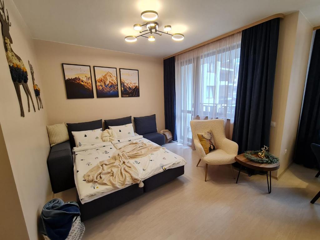 Postel nebo postele na pokoji v ubytování Mountain Peak Apartment