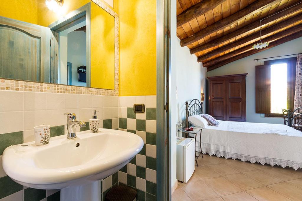 Postel nebo postele na pokoji v ubytování B&B Sa Specula IUN E4404
