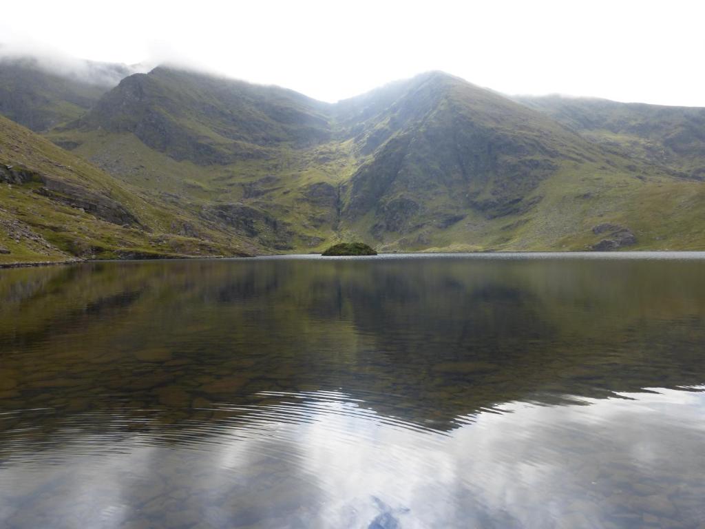 a view of a lake with mountains in the background at Oakfield in Kenmare