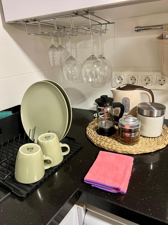 A kitchen or kitchenette at El patio de Lindo