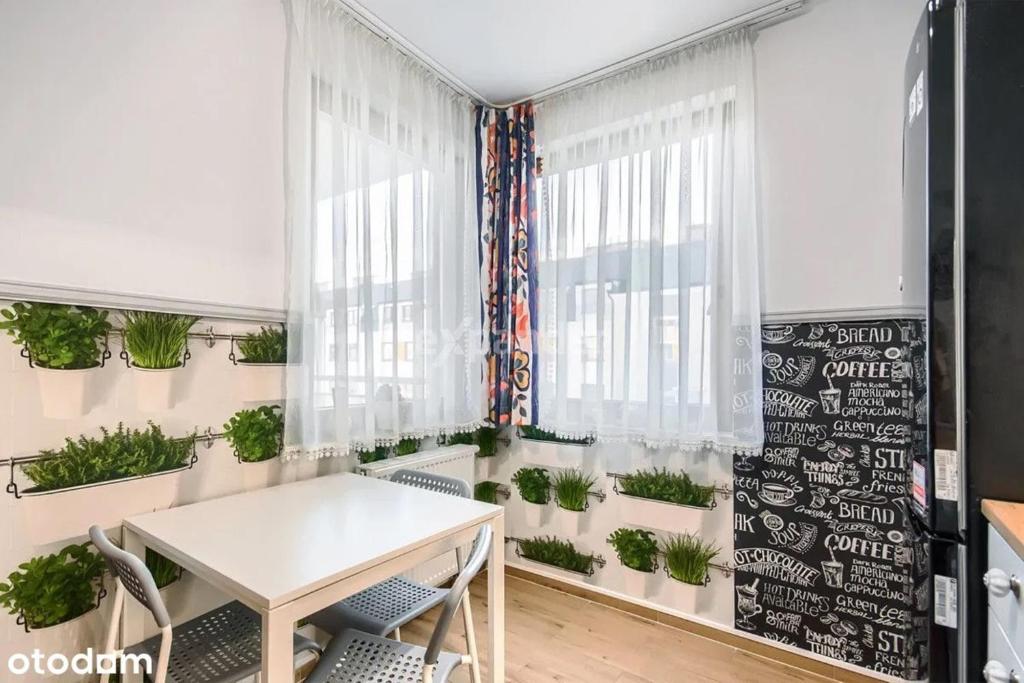 Televízia a/alebo spoločenská miestnosť v ubytovaní Studio LUX Gaj by Apartamenty na dni Wrocław