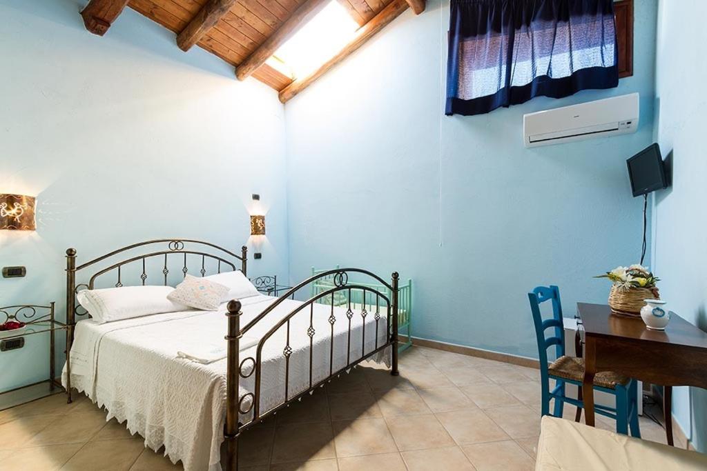Postel nebo postele na pokoji v ubytování B&B Sa Specula IUN E4404