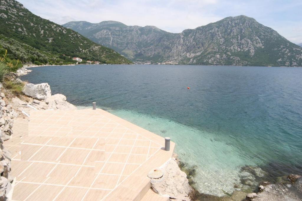 a view of a body of water with mountains at Villa Strp in Risan