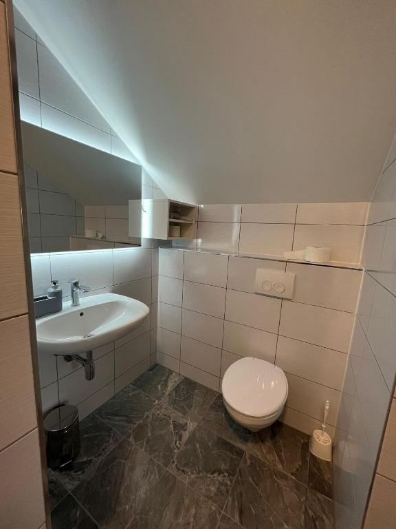 Kúpeľňa v ubytovaní Rooms Jelak