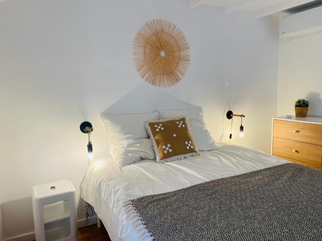 Postel nebo postele na pokoji v ubytování VILLA BEL - Entre paradis et vignes