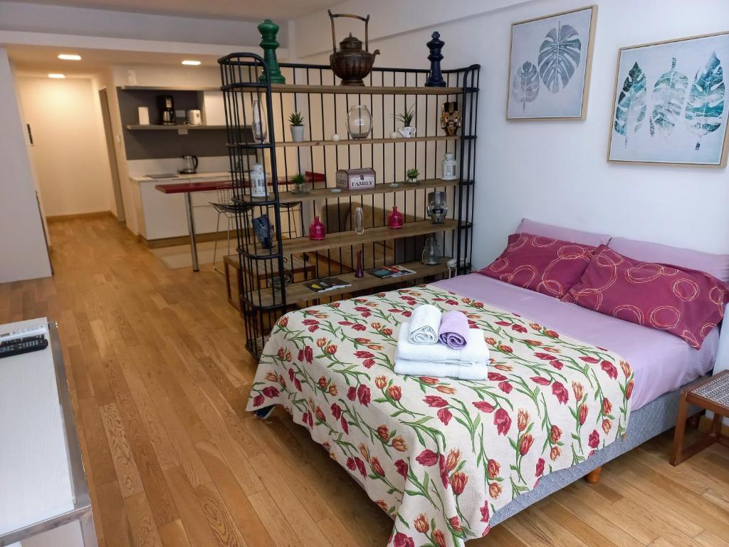 Postel nebo postele na pokoji v ubytování Lumiere Puerto Madero