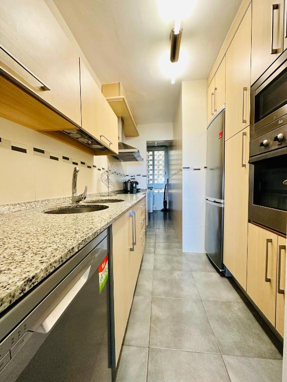 Kuchyňa alebo kuchynka v ubytovaní Home Rits Salou