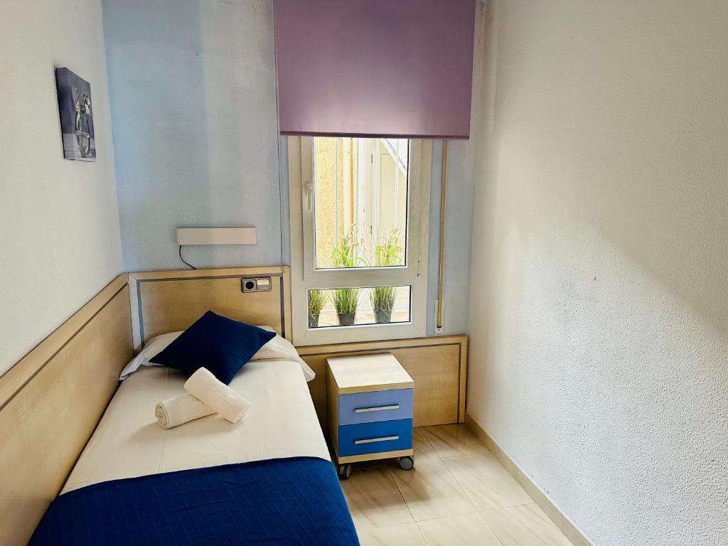 Posteľ alebo postele v izbe v ubytovaní Home Rits Salou