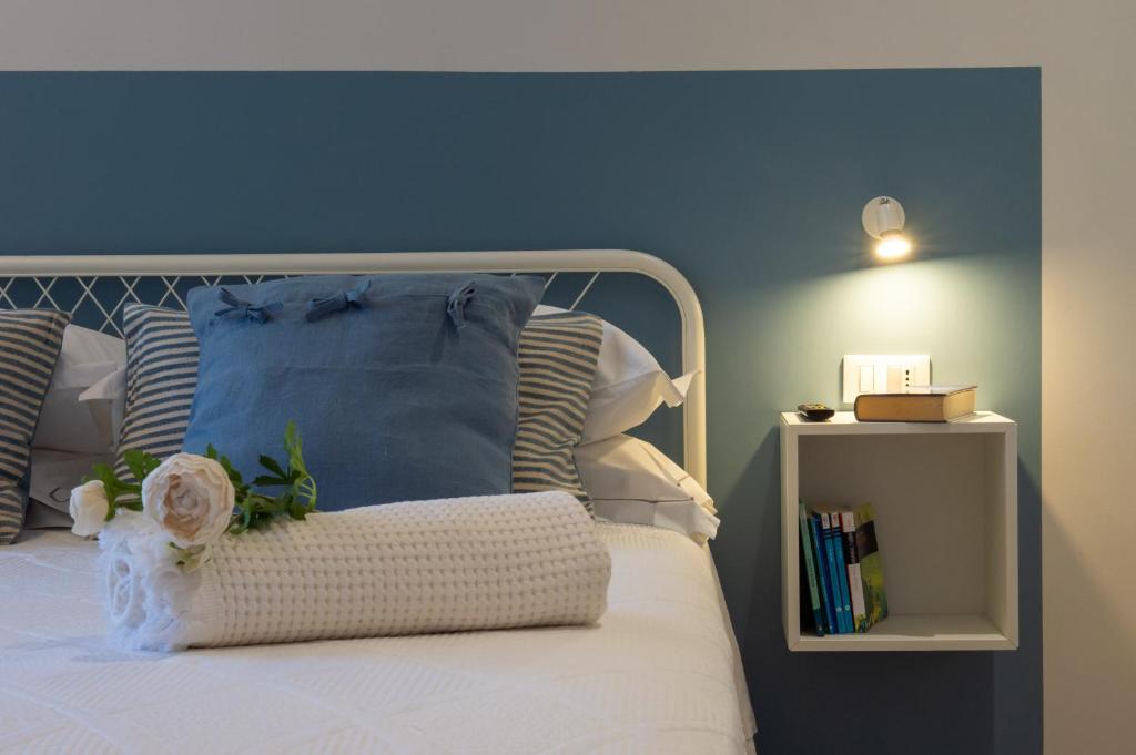Postel nebo postele na pokoji v ubytování Smart & Urban Suites - Corso51