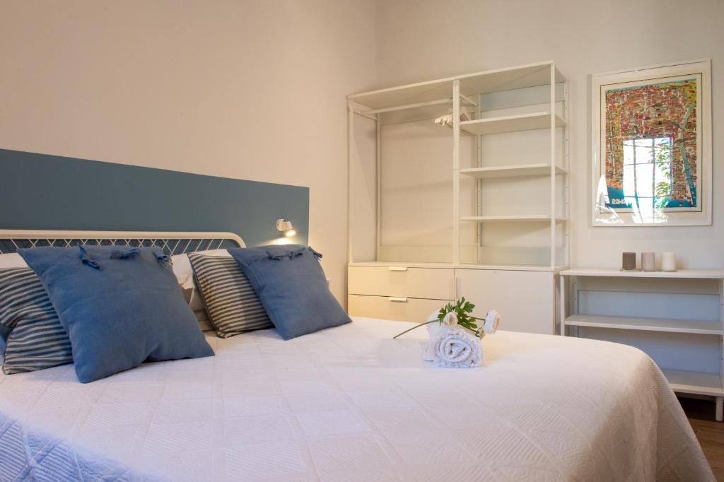 Postel nebo postele na pokoji v ubytování Smart & Urban Suites - Corso51