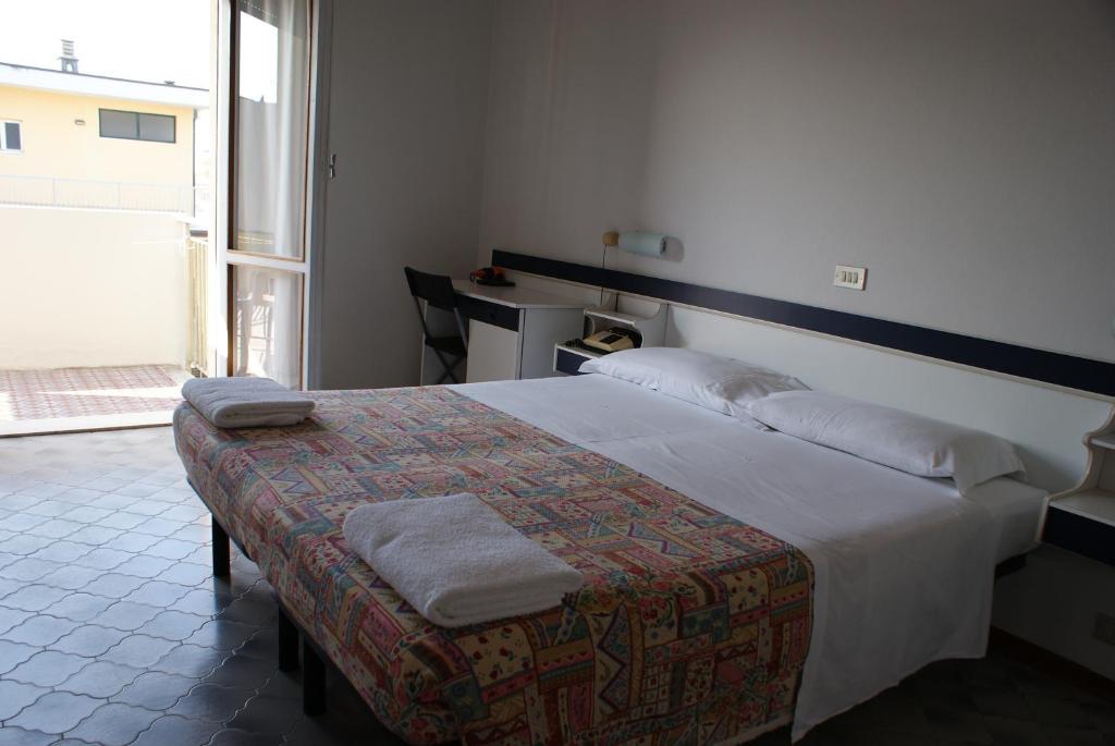 Postel nebo postele na pokoji v ubytování Hotel B&B Avana