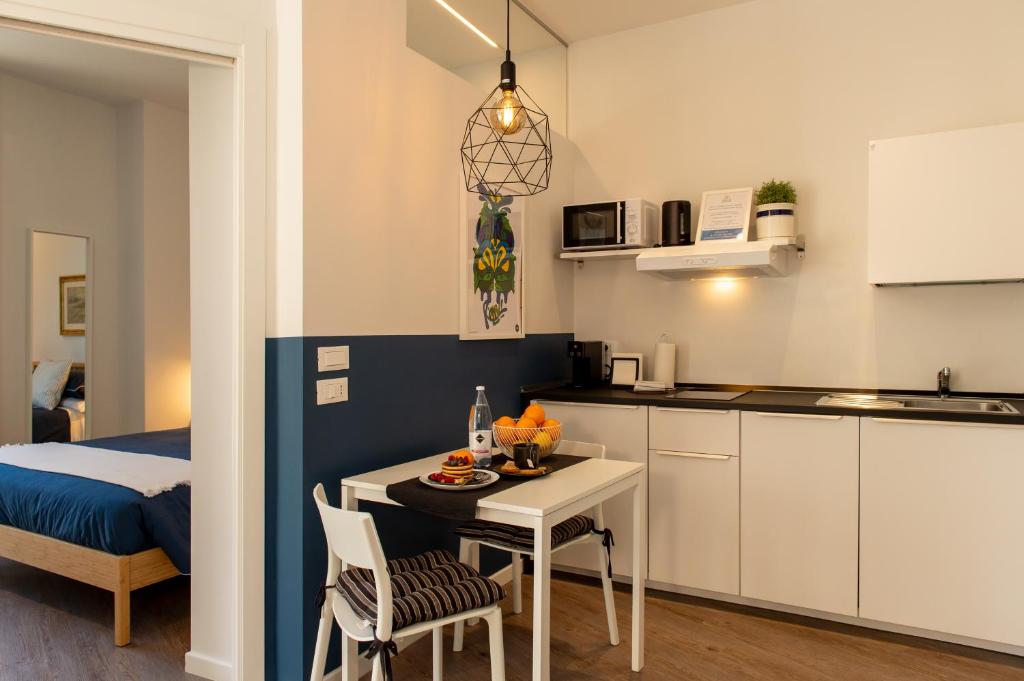 Kuchyň nebo kuchyňský kout v ubytování Smart & Urban Suites - Corso51