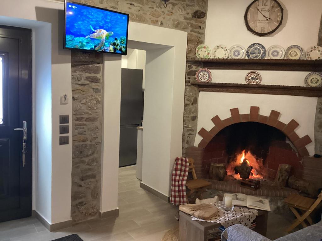 TV a/nebo společenská místnost v ubytování Casa Charma