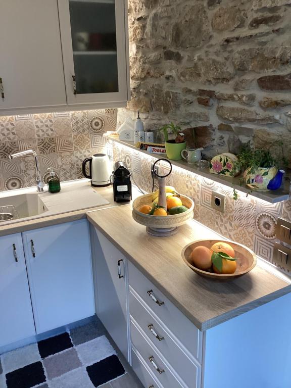 Kuchyň nebo kuchyňský kout v ubytování Casa Charma