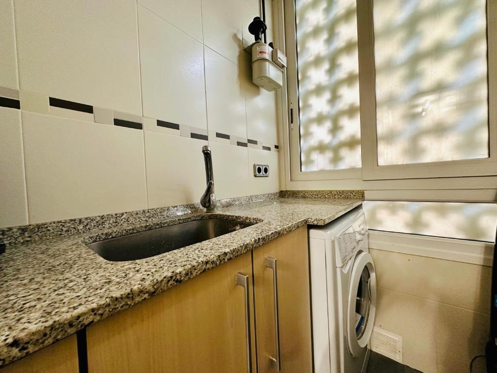 Kuchyňa alebo kuchynka v ubytovaní Home Rits Salou