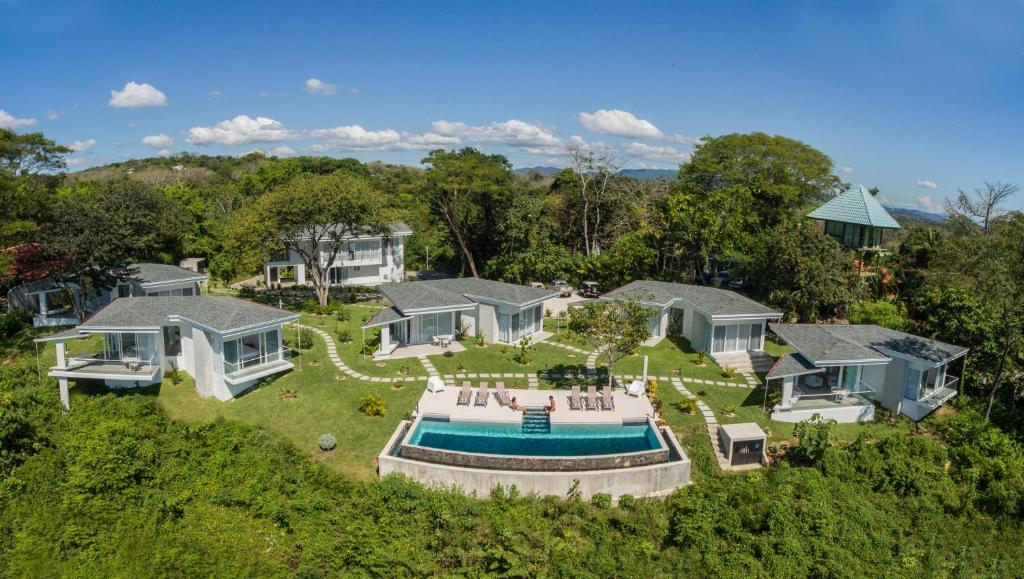an aerial view of a house with a swimming pool at Adeluna Luxury Villas in Montezuma