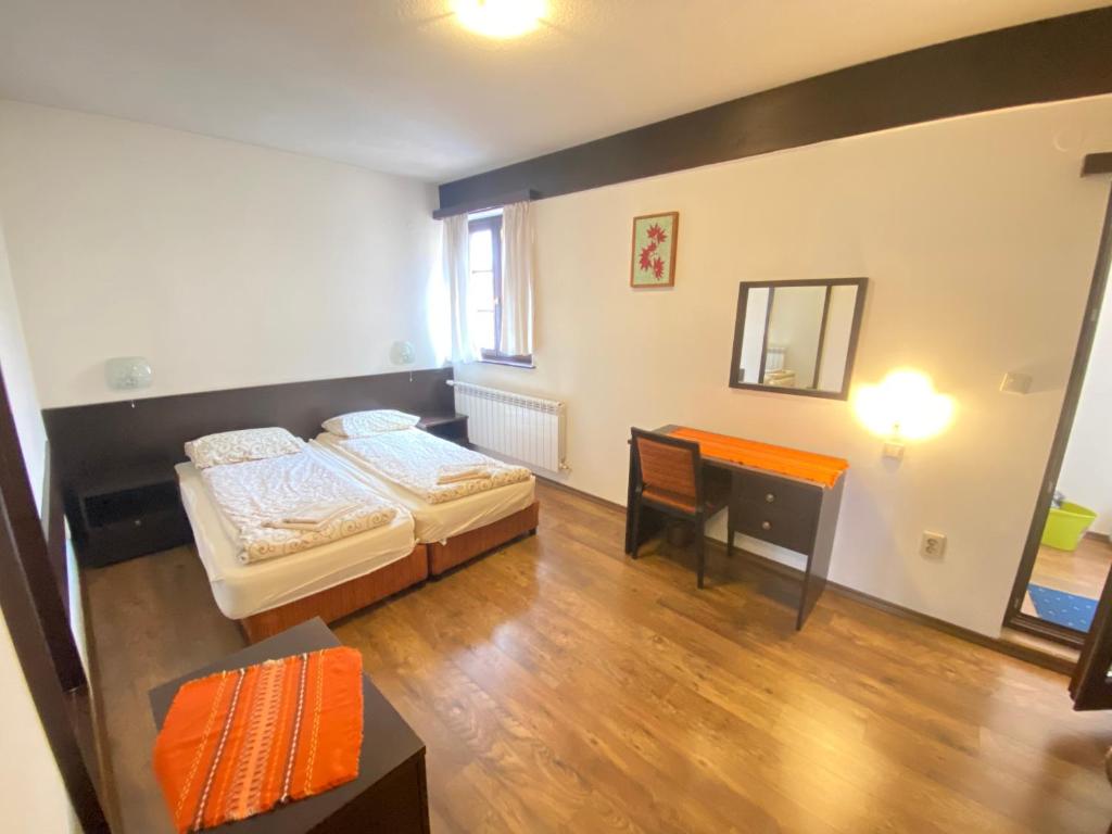 A bed or beds in a room at House Trivia