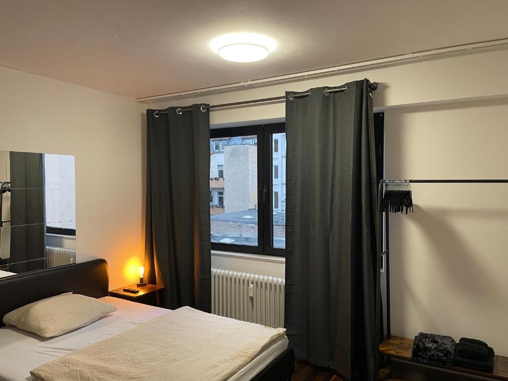 Postel nebo postele na pokoji v ubytování Music Residence