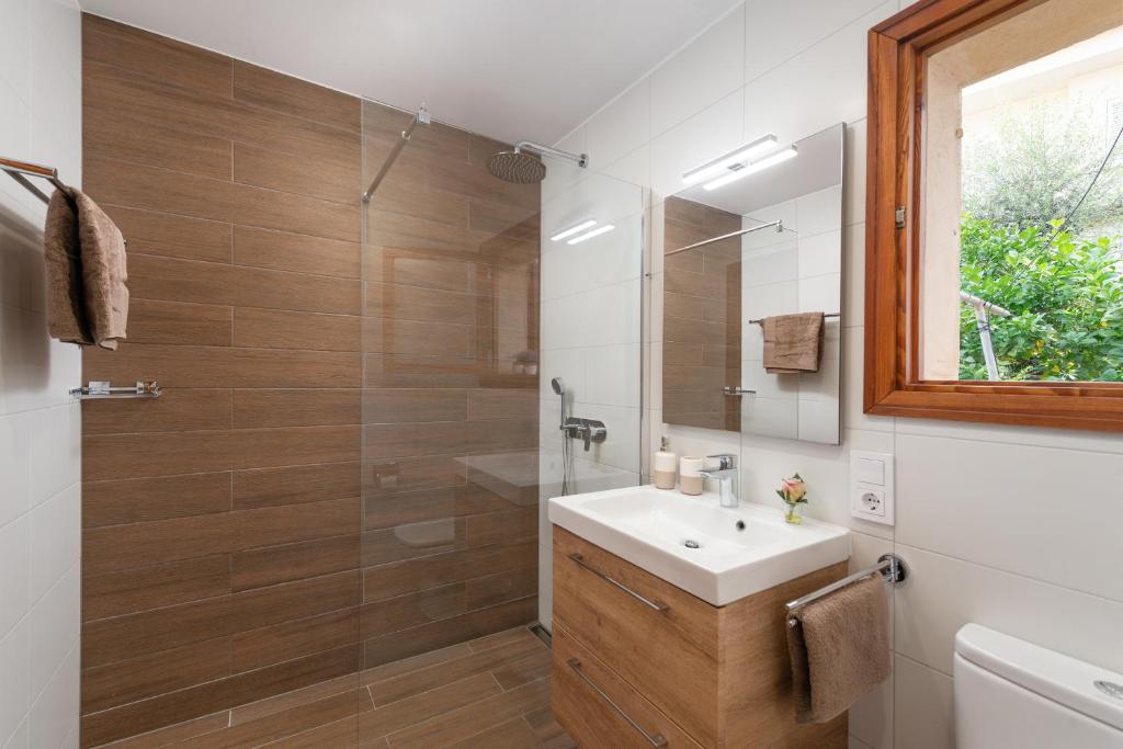 a bathroom with a sink and a shower at Chalet Son Gomila in the North of Mallorca in Cielo de Bonaire 