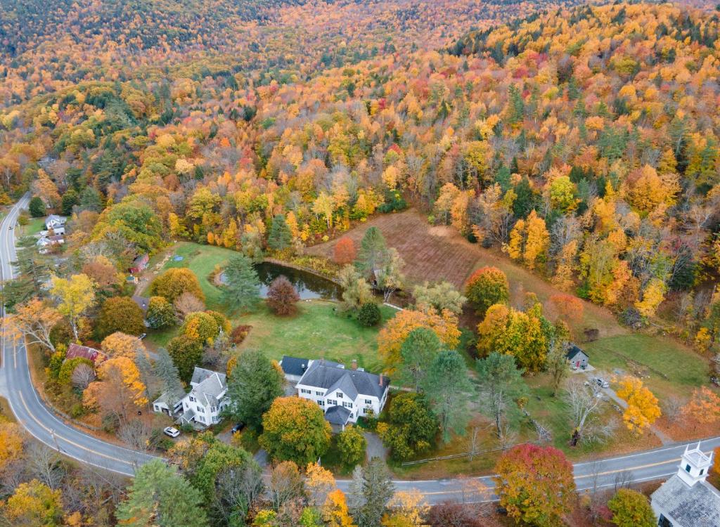 an aerial view of a house in the autumn foliage at Willow 