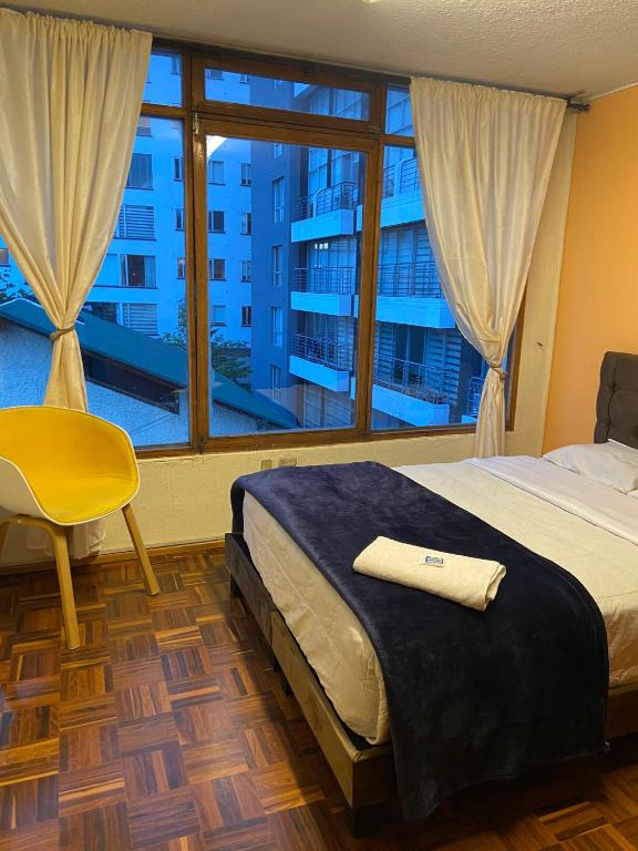 Postel nebo postele na pokoji v ubytování Blue house La Floresta