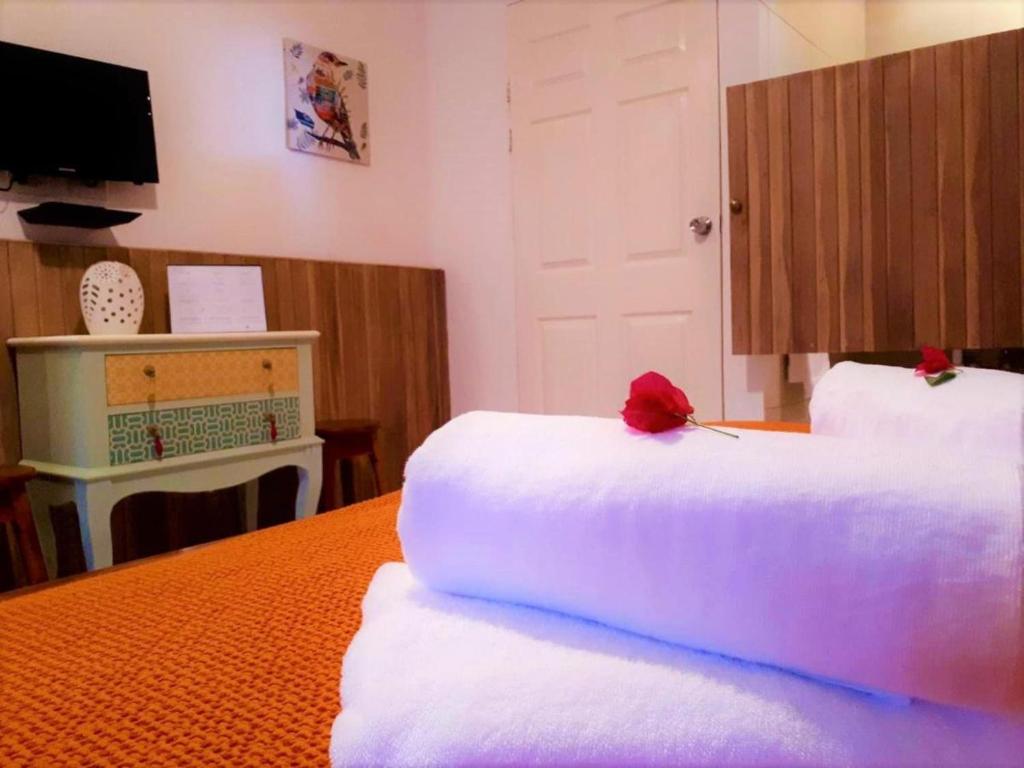 Postel nebo postele na pokoji v ubytování Casa Mapache