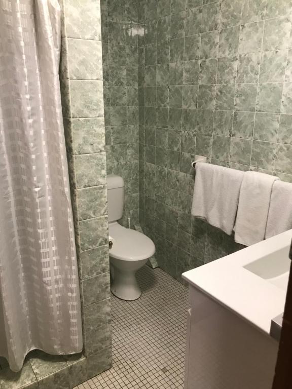 Koupelna v ubytování Downtown Motel