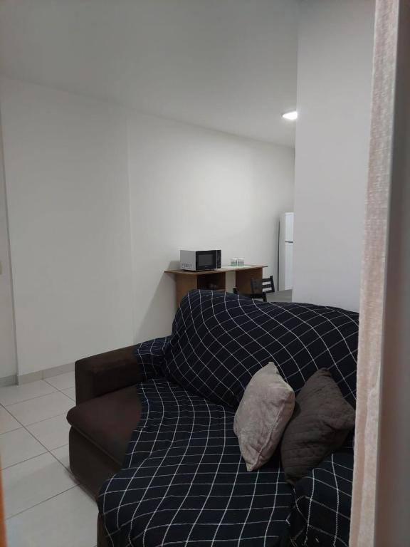 Postel nebo postele na pokoji v ubytování Itaguaí Flat - Centro