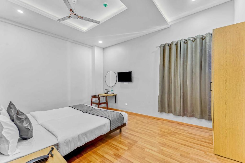 Postel nebo postele na pokoji v ubytování UPAR Hotels - T Nagar