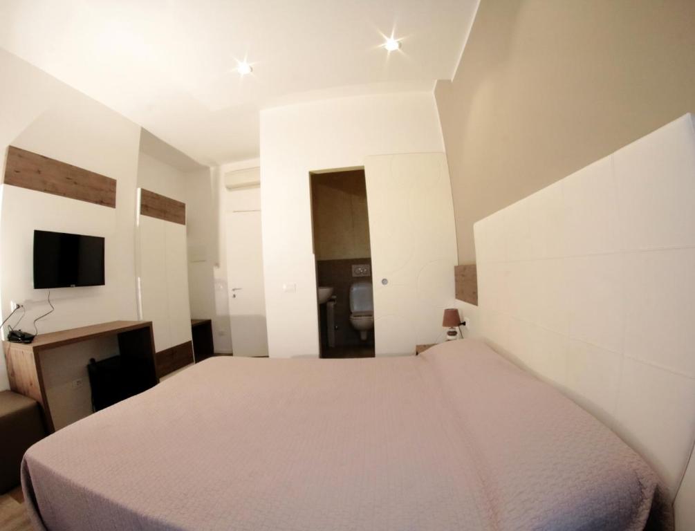 TV a/nebo společenská místnost v ubytování Albergo Rosa