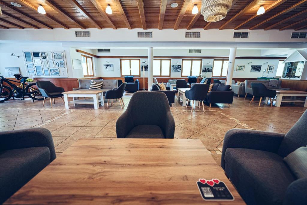 Posezení v ubytování Pohorje Village Wellbeing Resort - Forest Apartments Videc