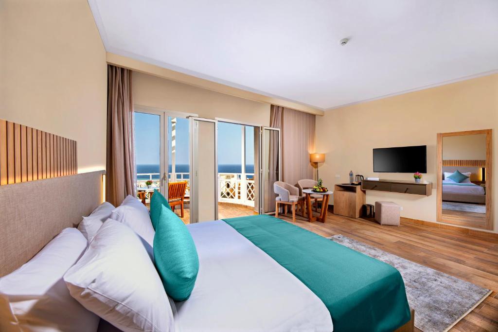 Кровать или кровати в номере Zen Resort Sahl Hasheesh by TBH Hotels