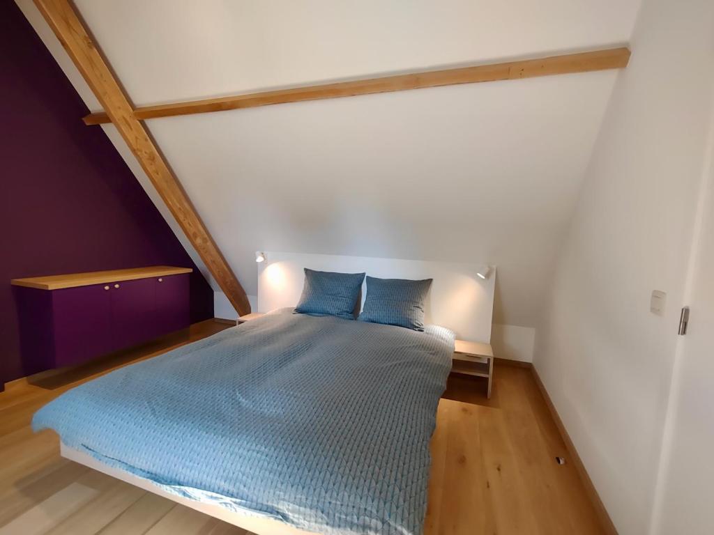 Postel nebo postele na pokoji v ubytování Nachtegael Zomerhuis, idyllische woning in de Vlaamse Ardennen