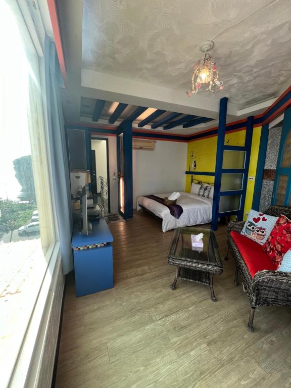 Postel nebo postele na pokoji v ubytování Ming Jun Homestay