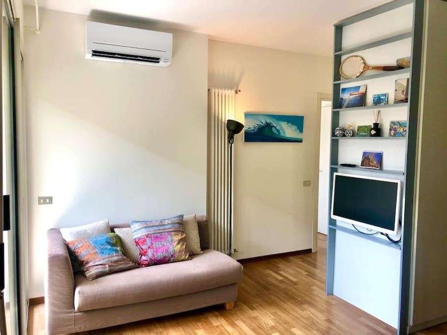 A television and/or entertainment centre at Mascalzone Latino, City center apartment